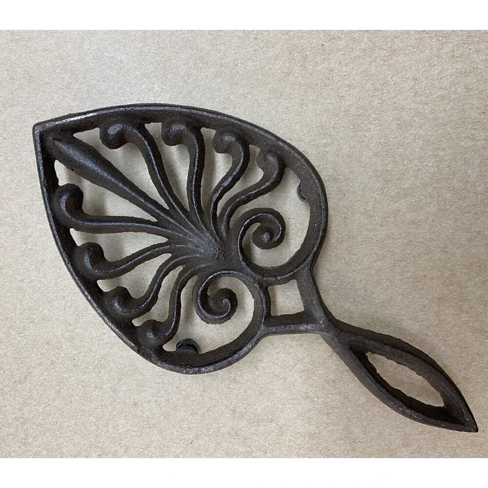 Brown Cast Iron Spade Footed Metal Trivet with handle 9.25 inches long